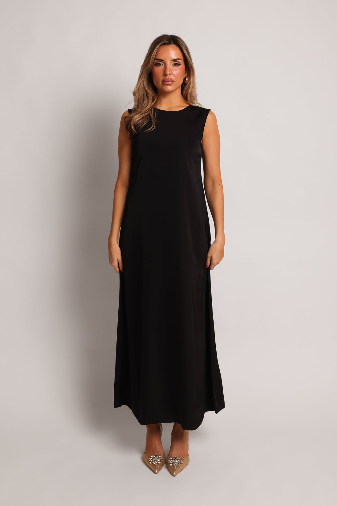 Black maxi underdress for layering under an open abaya