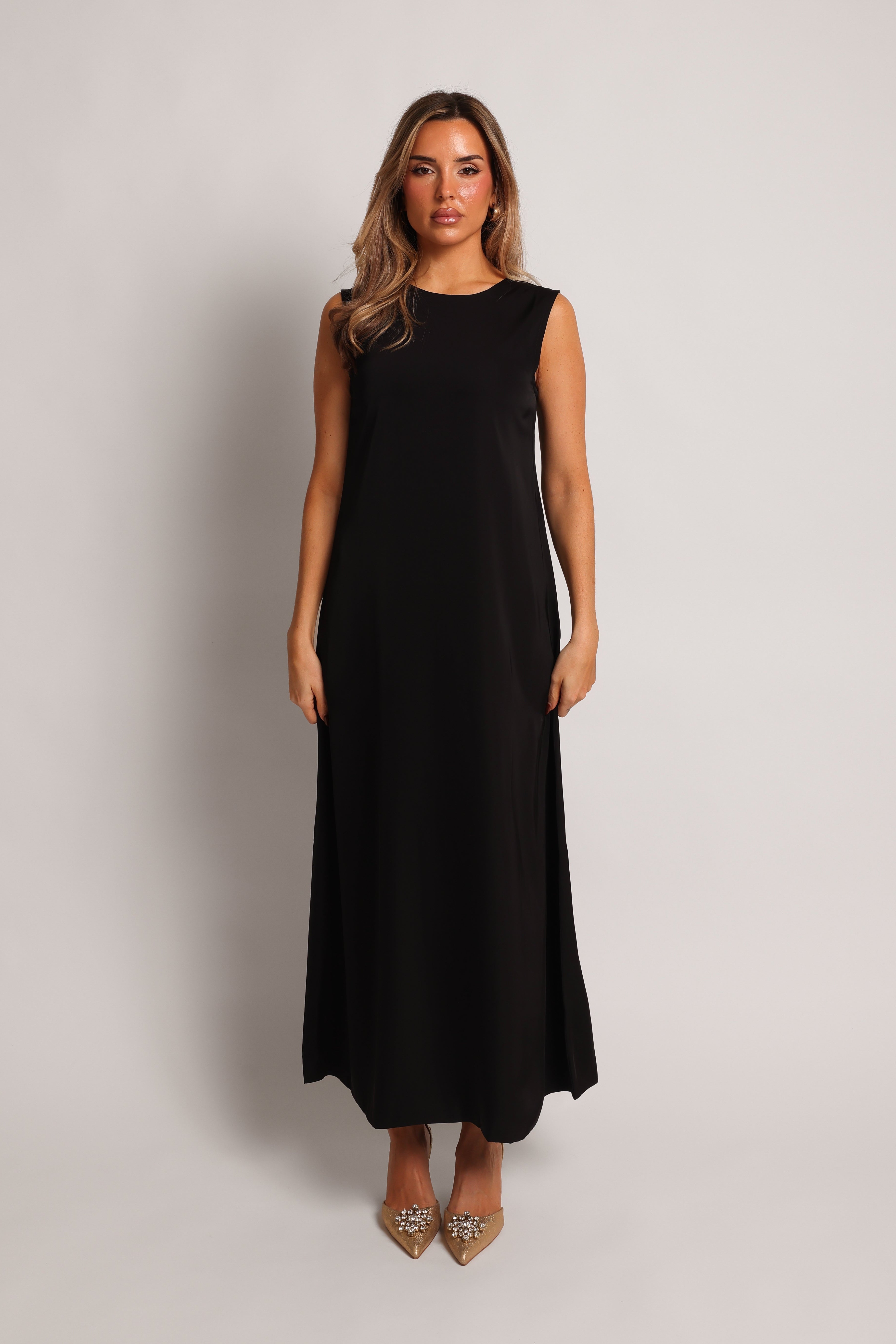 Black maxi underdress for layering under an open abaya