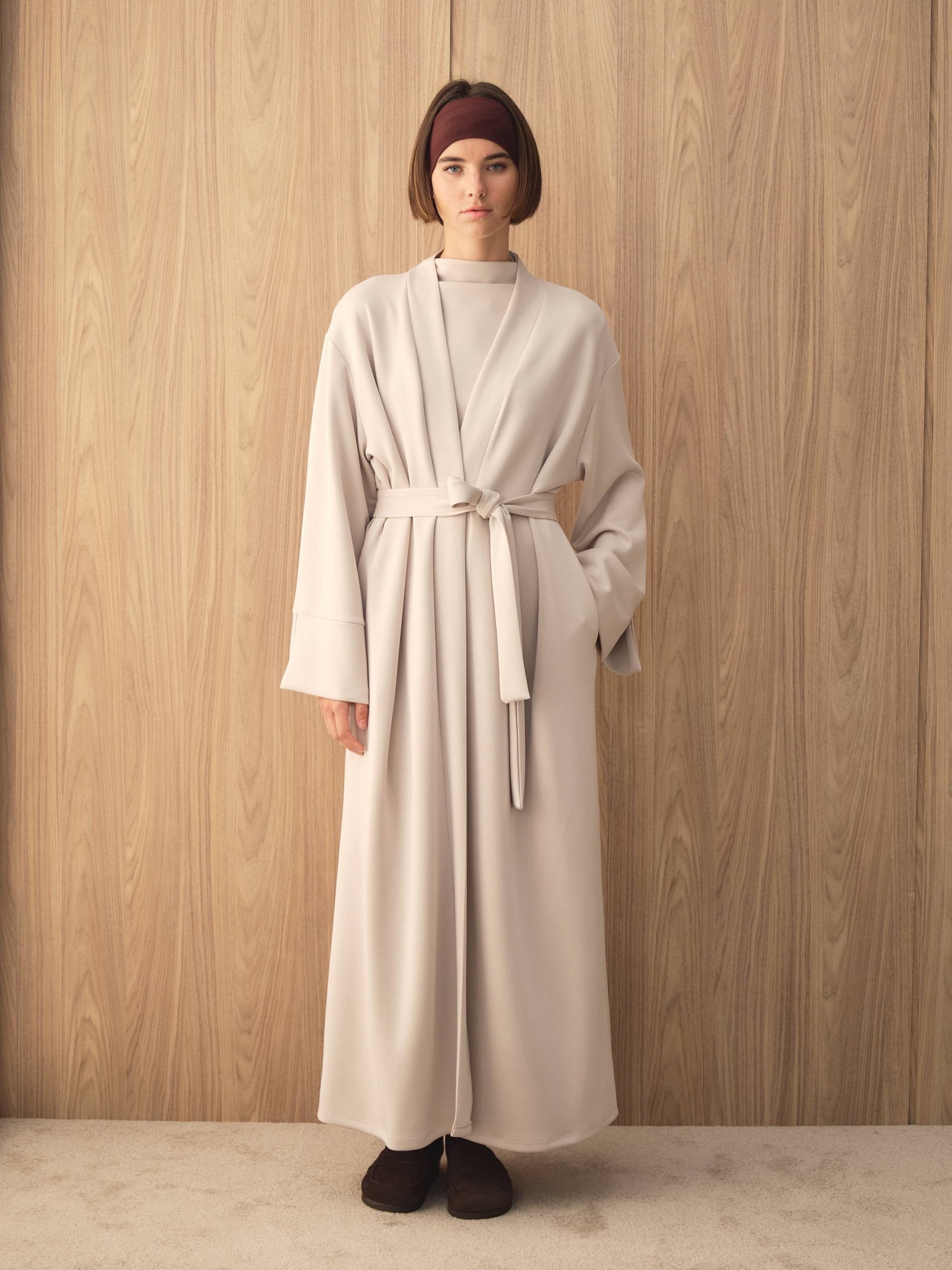 MOVE 01 Modal Stretch Abaya Set in Cloud Ecru, full-length belted styling view.