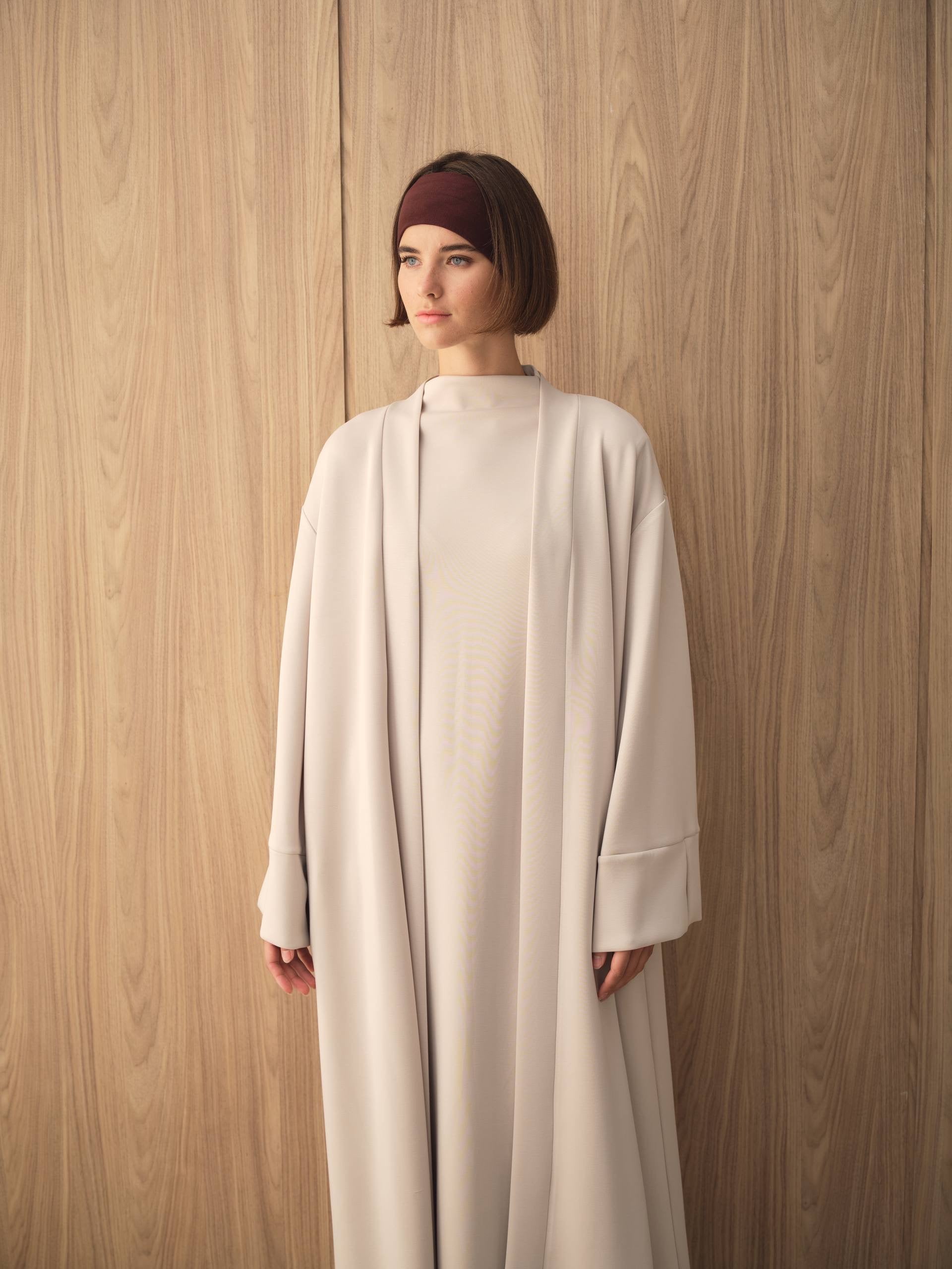 MOVE 01 Modal Stretch Abaya Set in Cloud Ecru, front detail view.