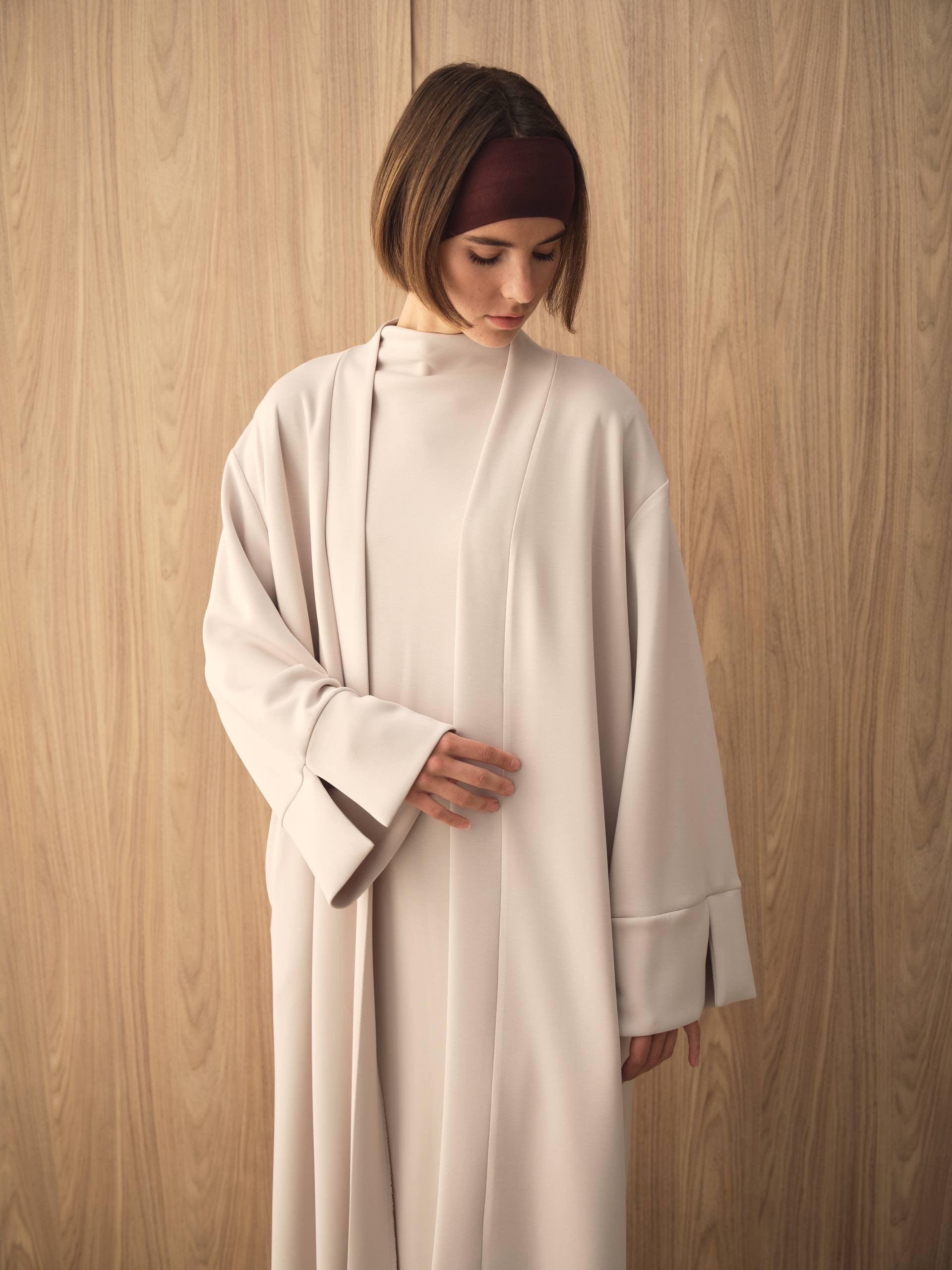 MOVE 01 Modal Stretch Abaya Set in Cloud Ecru, upper styling view.