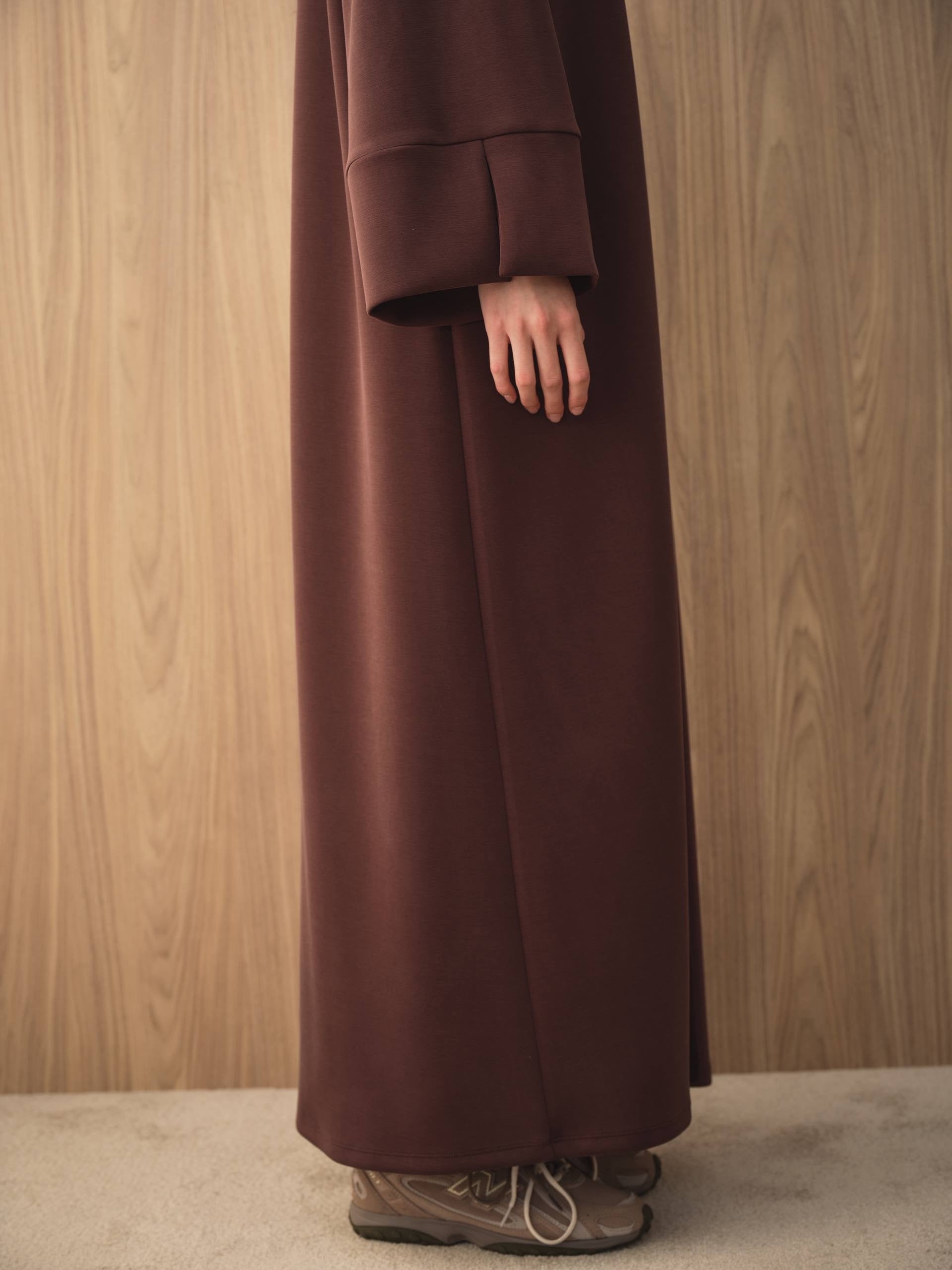 MOVE 01 Modal Stretch Abaya Set in Mahogany Burgundy, hem and cuff detail.