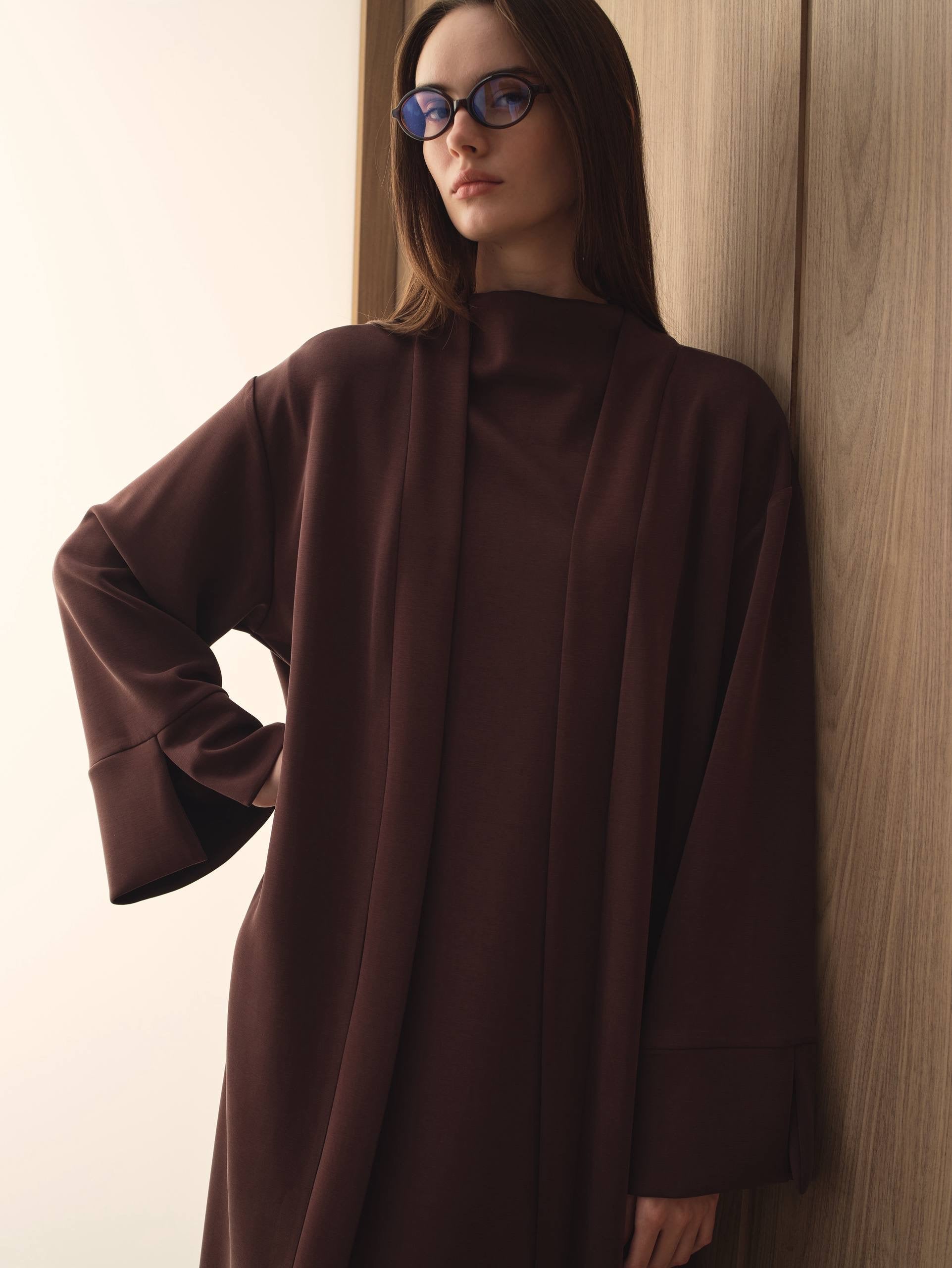 MOVE 01 Modal Stretch Abaya Set in Mahogany Burgundy, split cuff detail.