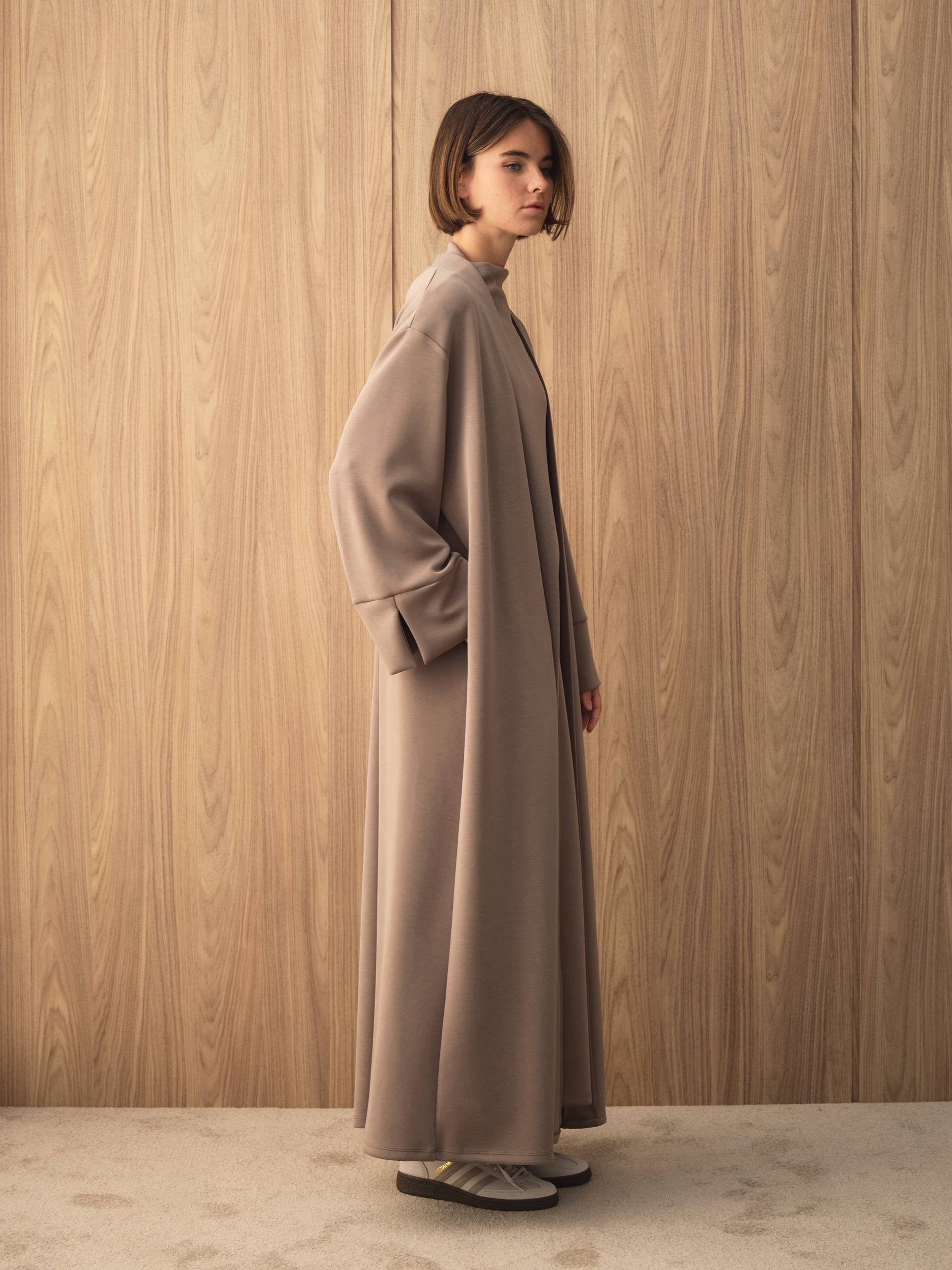 MOVE 01 Modal Stretch Abaya Set in Mushroom Taupe, side profile view.