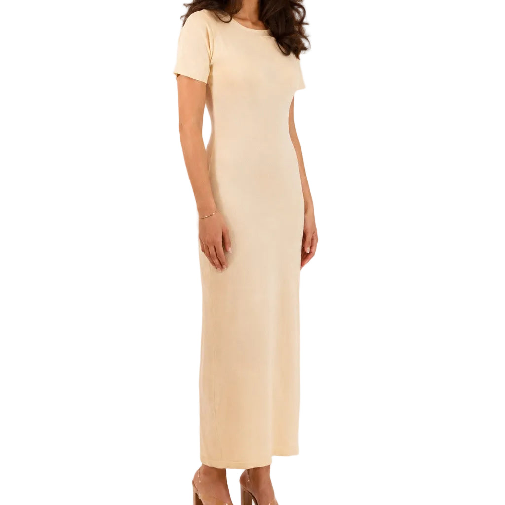 Ivory Cream Sienna knitted maxi underdress, three-quarter front view showing the short sleeves and fitted maxi silhouette.